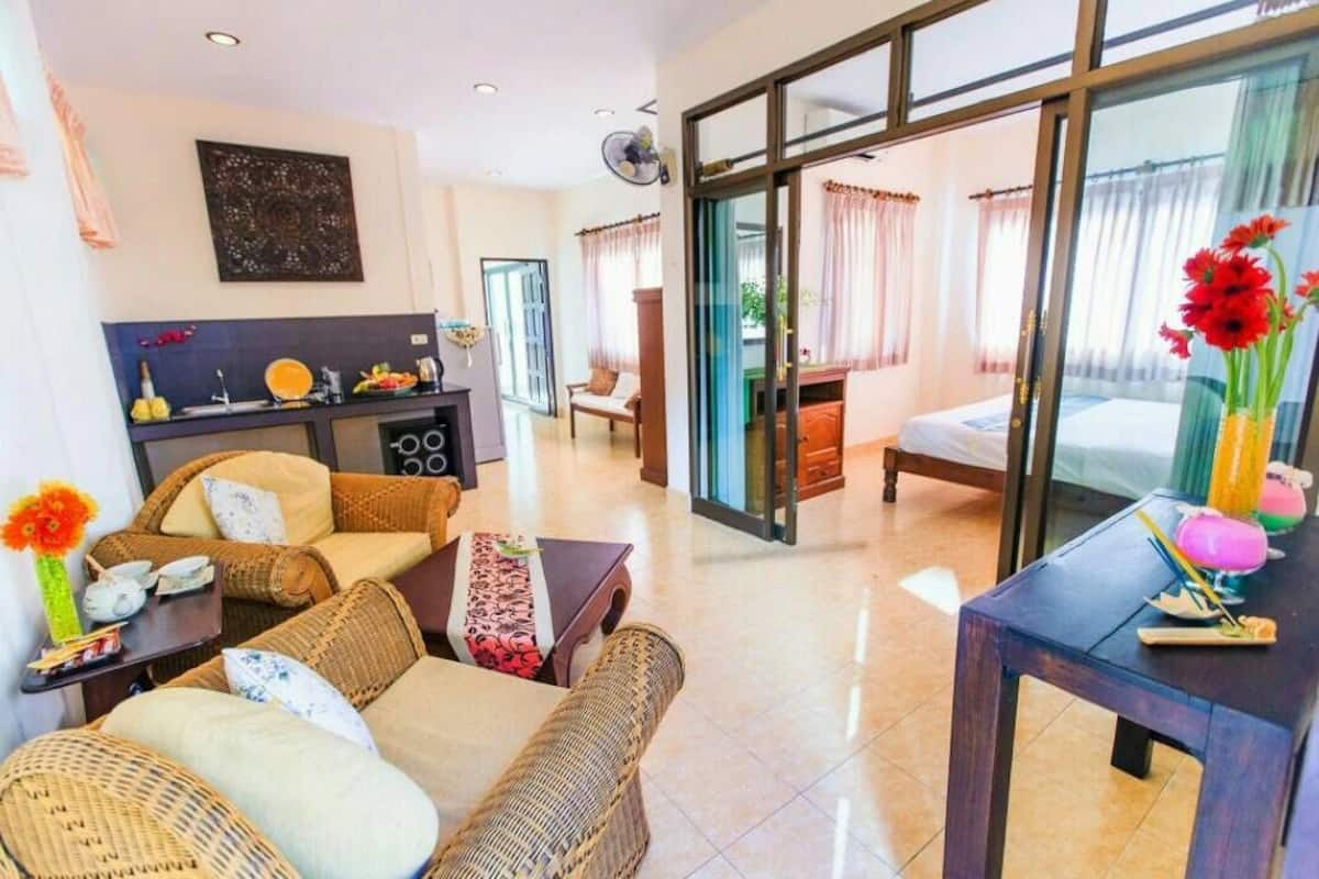 family quadruple room | living area | 24-inch flat-screen tv with cable channels, tv