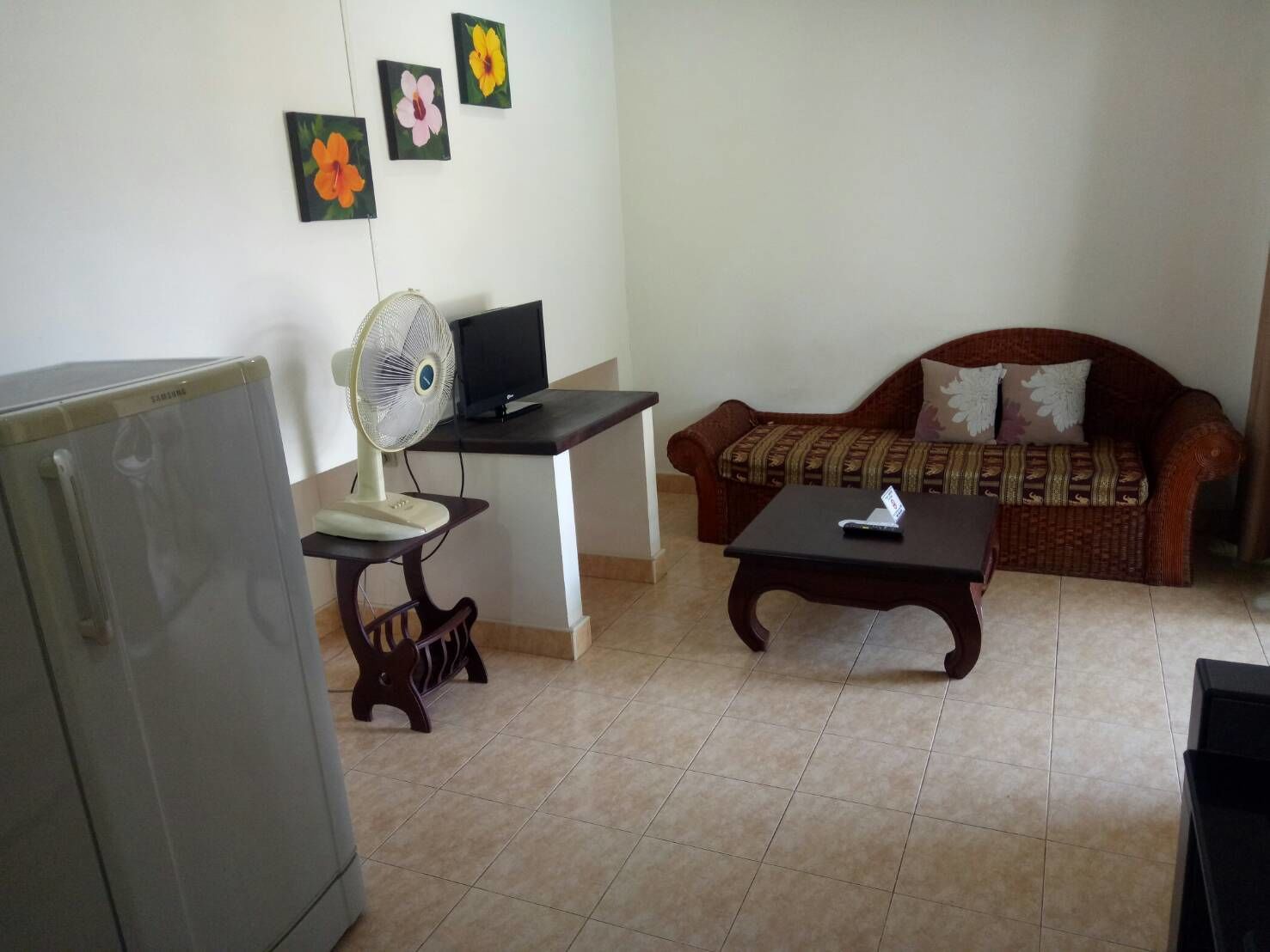 family quadruple room | living area | 24-inch flat-screen tv with cable channels, tv