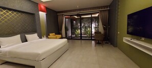 Premium Room, Ground Floor | Blackout drapes, free WiFi, bed sheets, wheelchair access