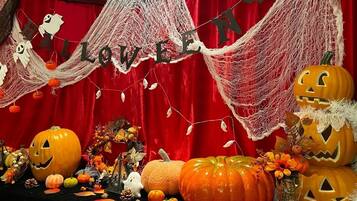 A Halloween-themed display with pumpkins and decorative elements.