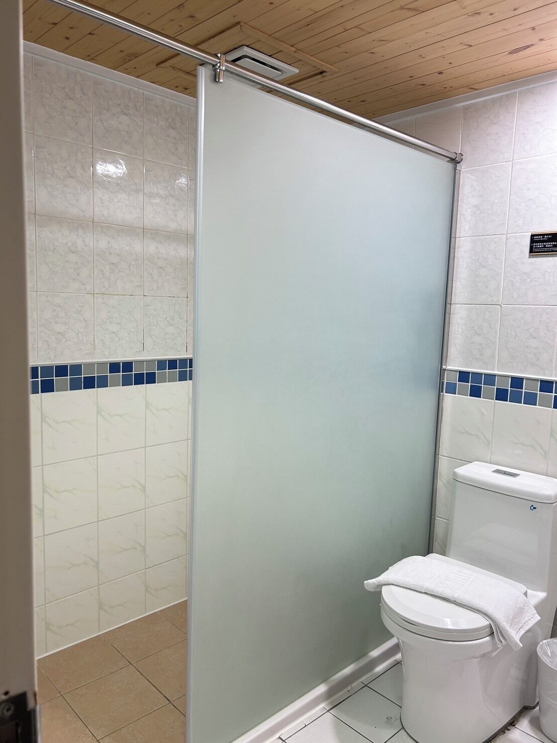 hair dryer, slippers, towels, shampoo