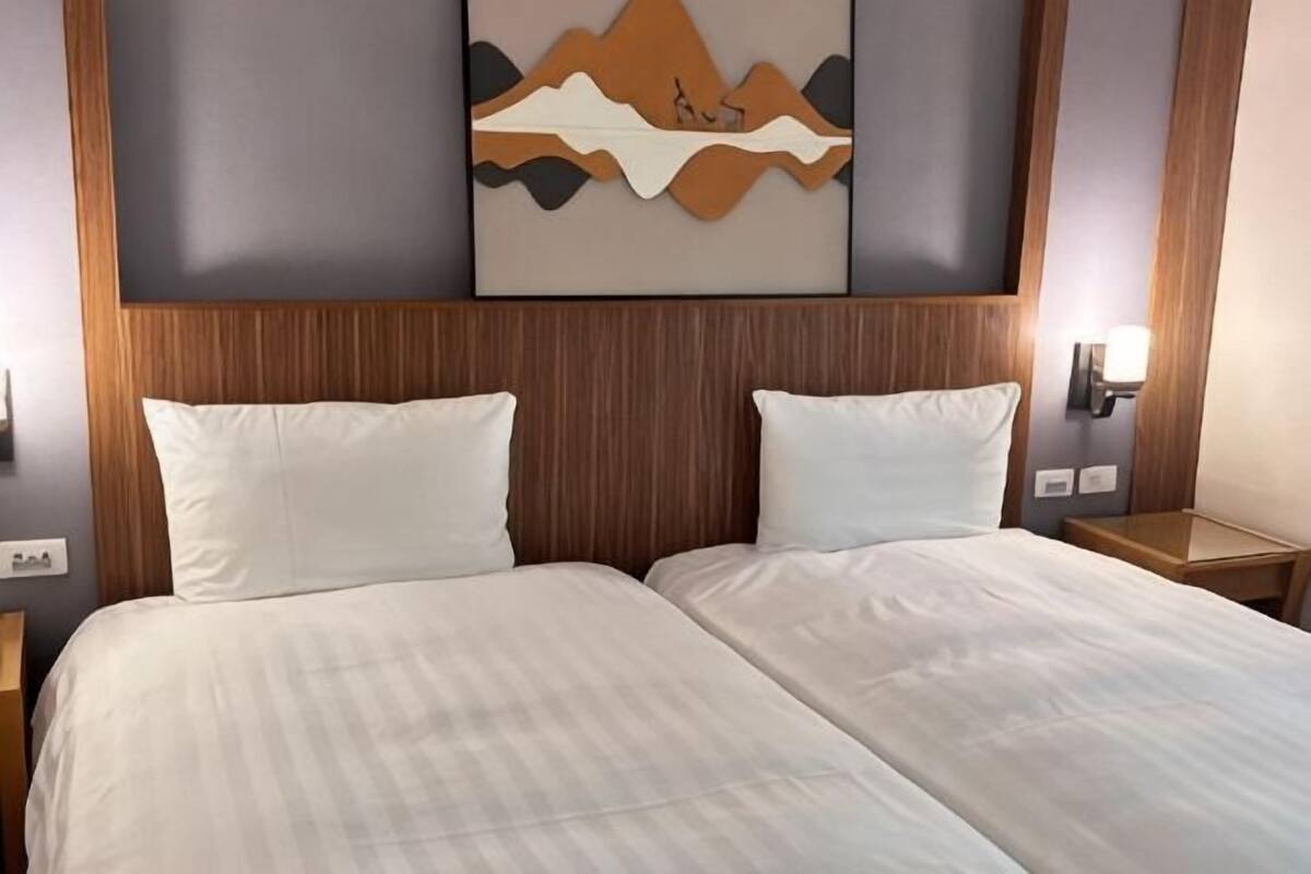 Premium bedding, down comforters, desk, laptop workspace