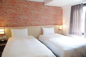 Premium bedding, down duvets, desk, laptop workspace