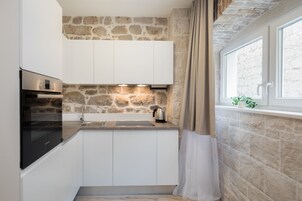 Studio (Ground Floor) | Private kitchen | Fridge, oven, stovetop, dishwasher