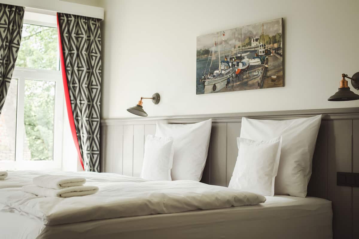 Suite, 1 cama Queen size | Minibar, caja de seguridad en la habitación y decoración personalizada