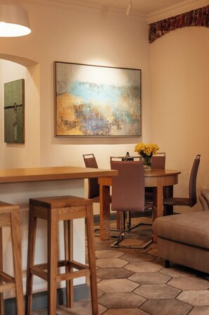 Apartment, Kitchen | Minibar, in-room safe, individually decorated, individually furnished - Art Hotel Roma (Liepaja)