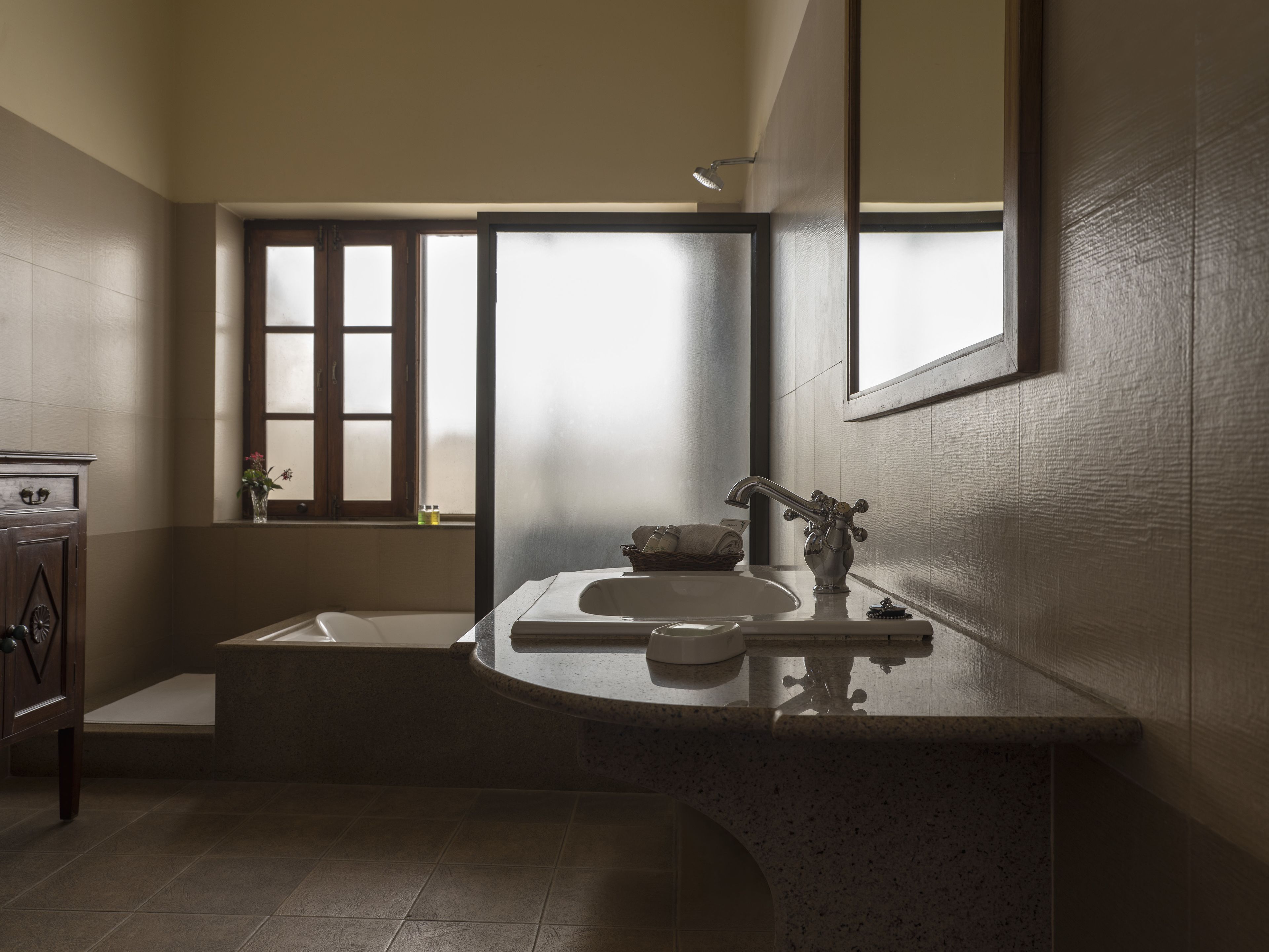 standard double or twin room | bathroom | deep-soaking bathtub, rainfall showerhead, free toiletries, hair dryer