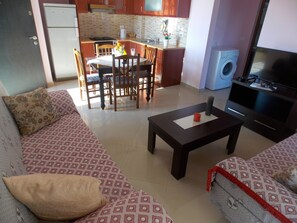 Apartment, 1 Bedroom, Balcony | Living area | Flat-screen TV - Yellow City Apartments (Sarandë)