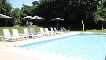 Outdoor pool, pool umbrellas, pool loungers