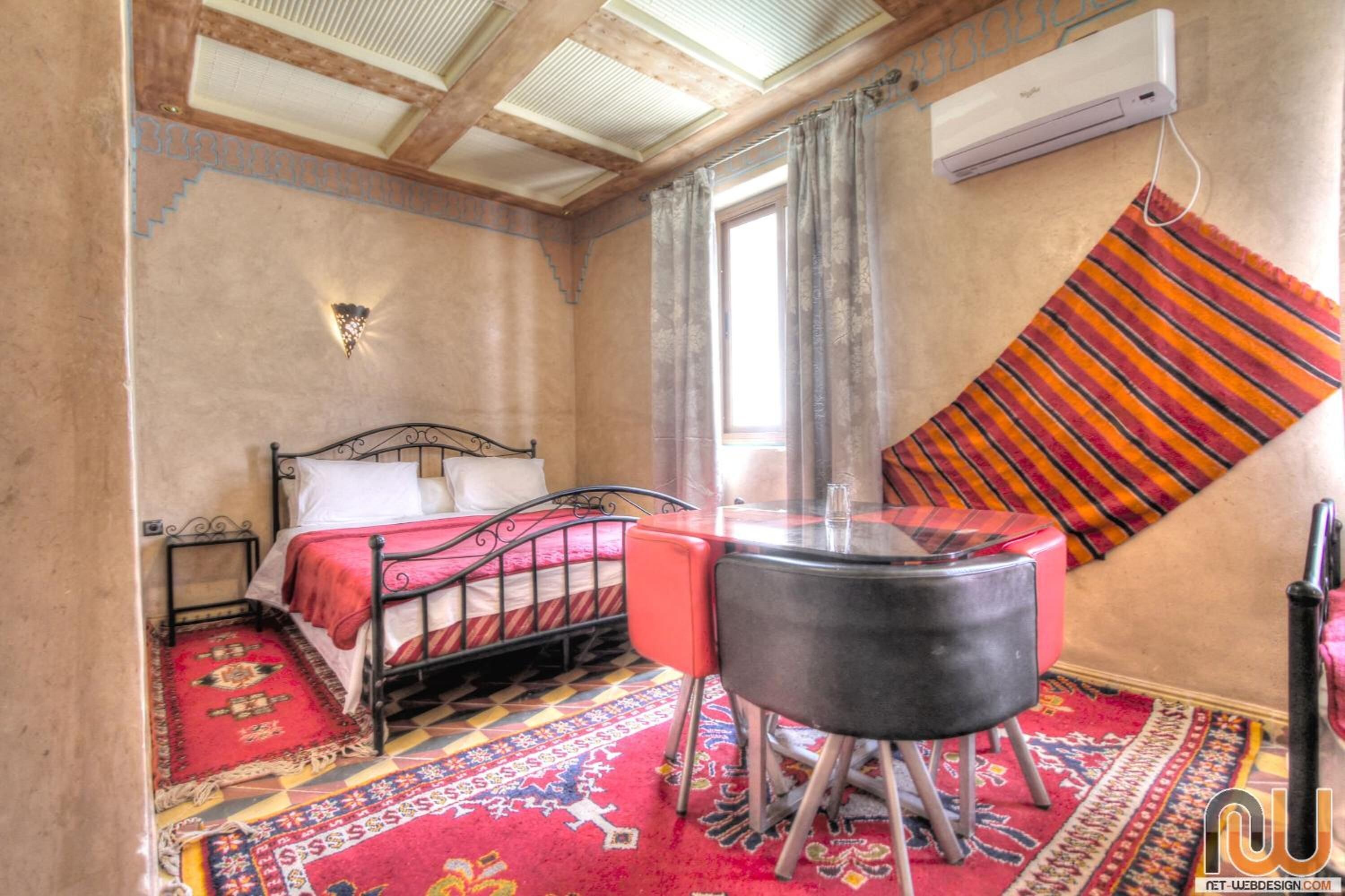 Desk, blackout curtains, iron/ironing board, bed sheets