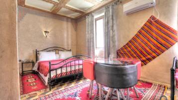 Desk, blackout curtains, iron/ironing board, bed sheets