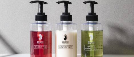 Three bottles of Hotel Hankyu products on a shelf.