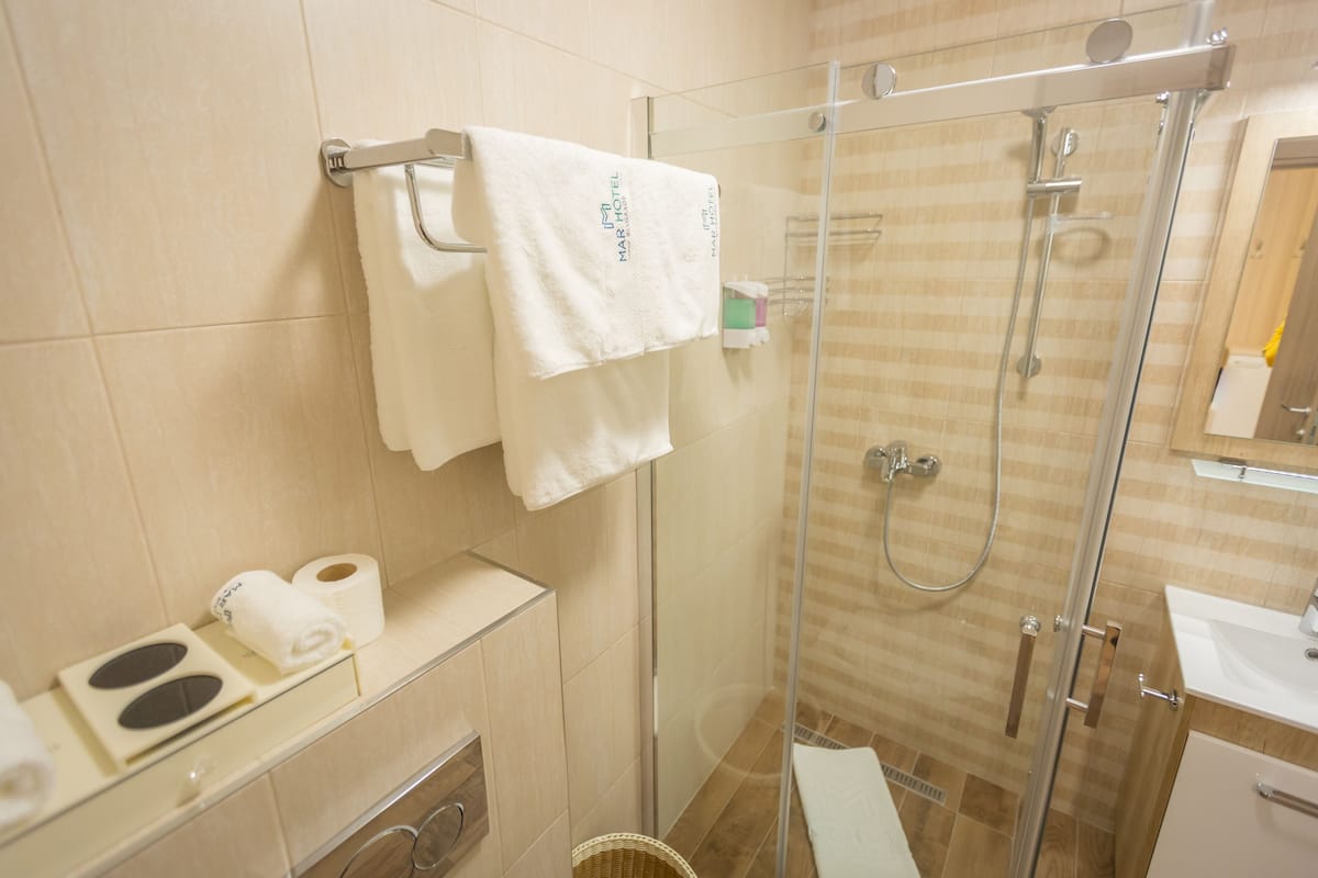 shower, free toiletries, hair dryer, bathrobes