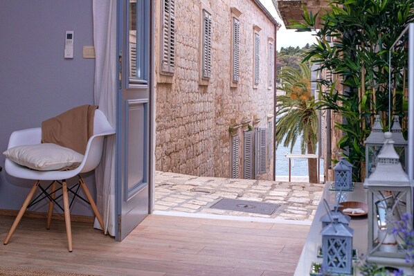 Design Apartment, Partial Sea View | Living area | LCD TV - Heraclea Luxury Heritage Accommodation (Hvar)