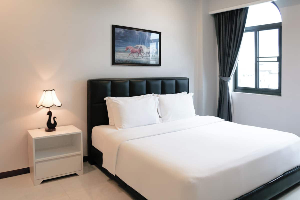 Two-Bedroom Suite | Minibar, in-room safe, desk, laptop workspace