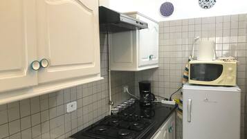 Apartment, 2 Bedrooms | Private kitchen | Fridge, microwave, stovetop, espresso maker