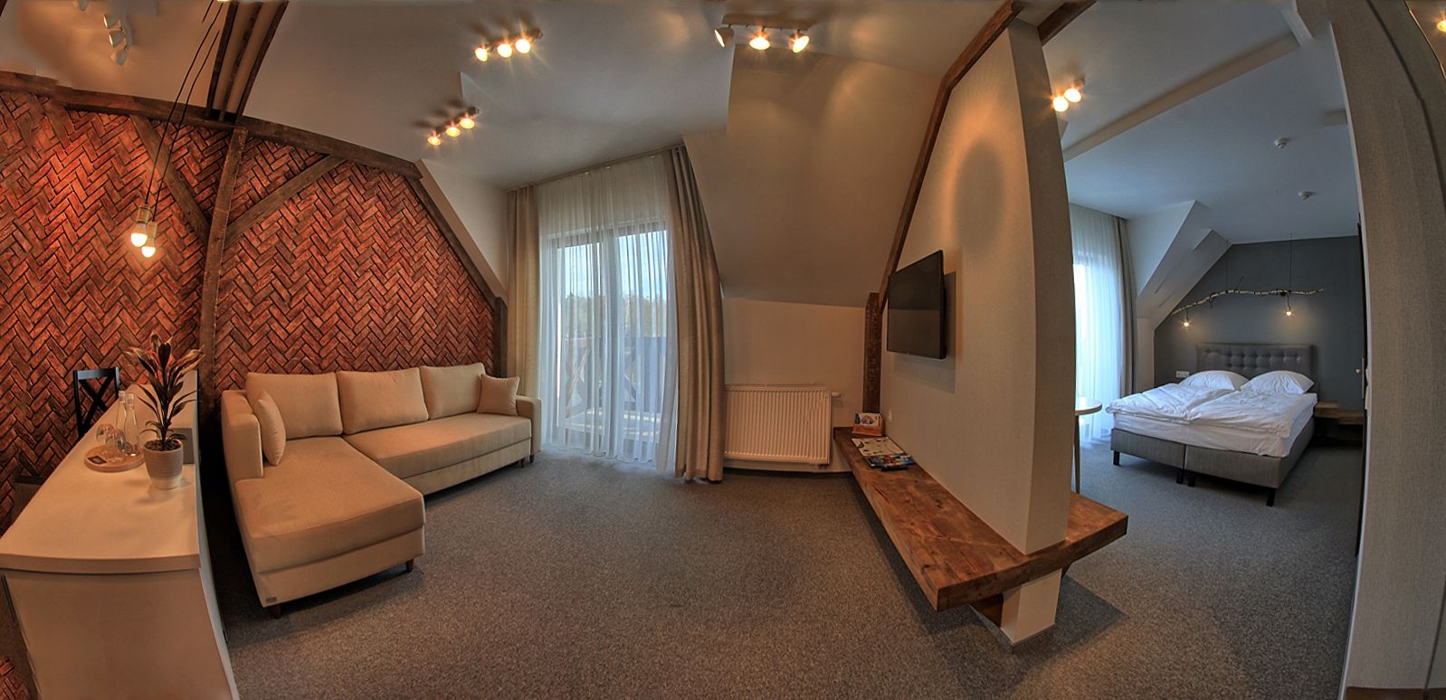 deluxe suite, 1 queen bed, lake view | in-room safe, desk, blackout curtains, rollaway beds