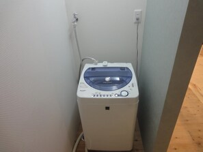 Shower, slippers, bidet, towels