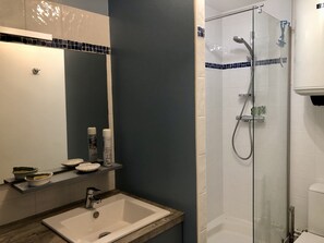 Shower, hair dryer, towels, soap