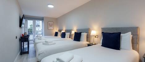 Quadruple Room, 4 Twin Beds | Free WiFi, bed sheets