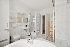 Three-Bedroom Duplex Suite | Bathroom | Separate tub and shower, free toiletries, hair dryer, towels