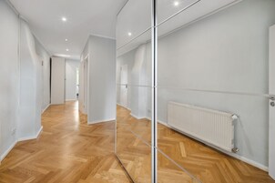 Four-Bedroom Duplex Suite with terrace | Living area | 50-inch Smart TV with satellite channels, TV