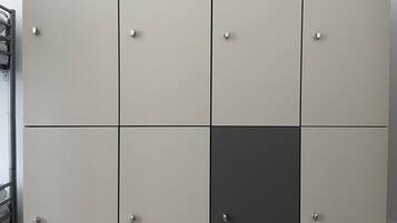 A set of lockers with a uniform design, arranged in a grid pattern.