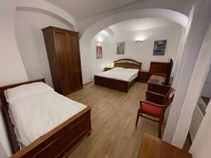 Quartos à prova de som, Wi-Fi de cortesia, roupa de cama