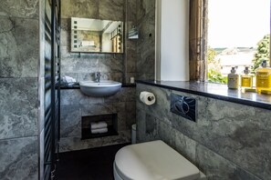 Junior Suite with Garden View | Bathroom | Combined shower/tub, deep soaking tub, designer toiletries, hair dryer