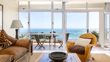 Premier Apartment, 1 Queen Bed, Ocean View | Living area | Flat-screen TV