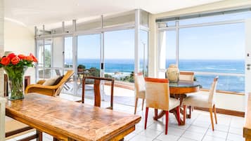 Premier Apartment, 1 Queen Bed, Ocean View | Living room | Flat-screen TV