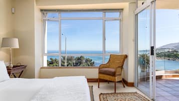 Premier Apartment, 1 Queen Bed, Ocean View | 1 bedroom, desk, iron/ironing board, travel crib