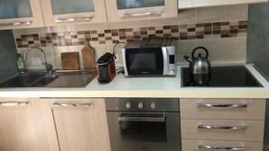 Deluxe Apartment, 1 Bedroom, Terrace | Private kitchen - San Pietro Home (Rome)