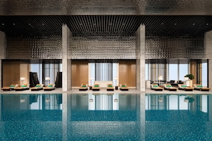 Indoor pool, open 6:00 AM to 10:00 PM, pool umbrellas, pool loungers