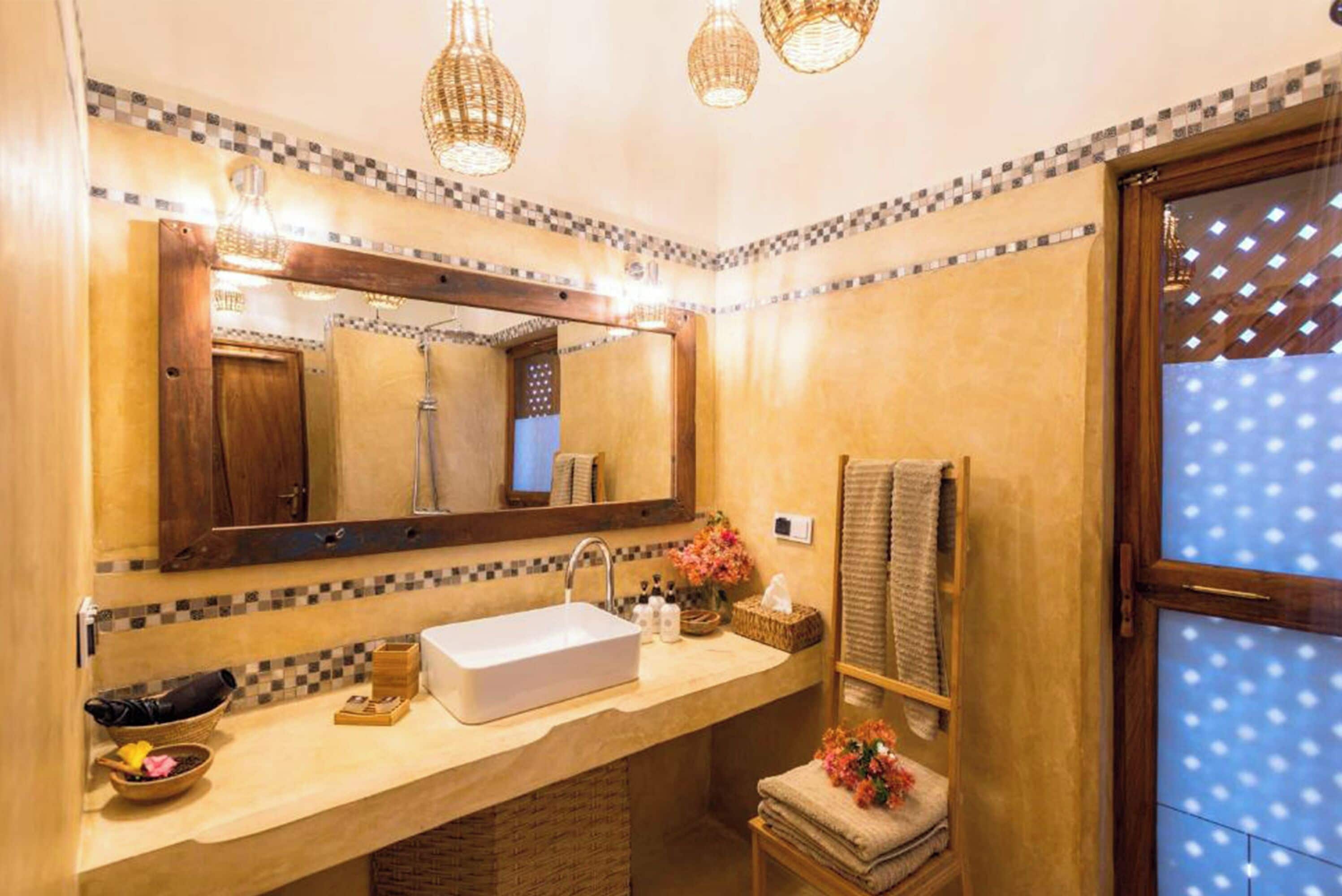 designer toiletries, hair dryer, towels, soap