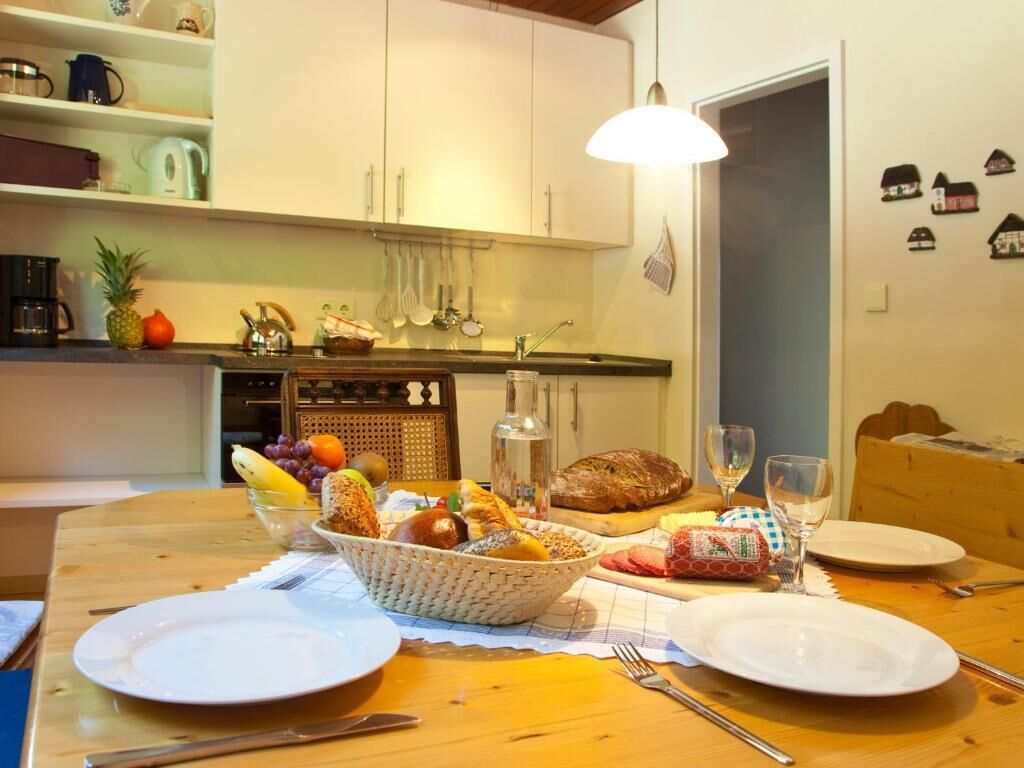 Full-sized fridge, microwave, stovetop, coffee/tea maker