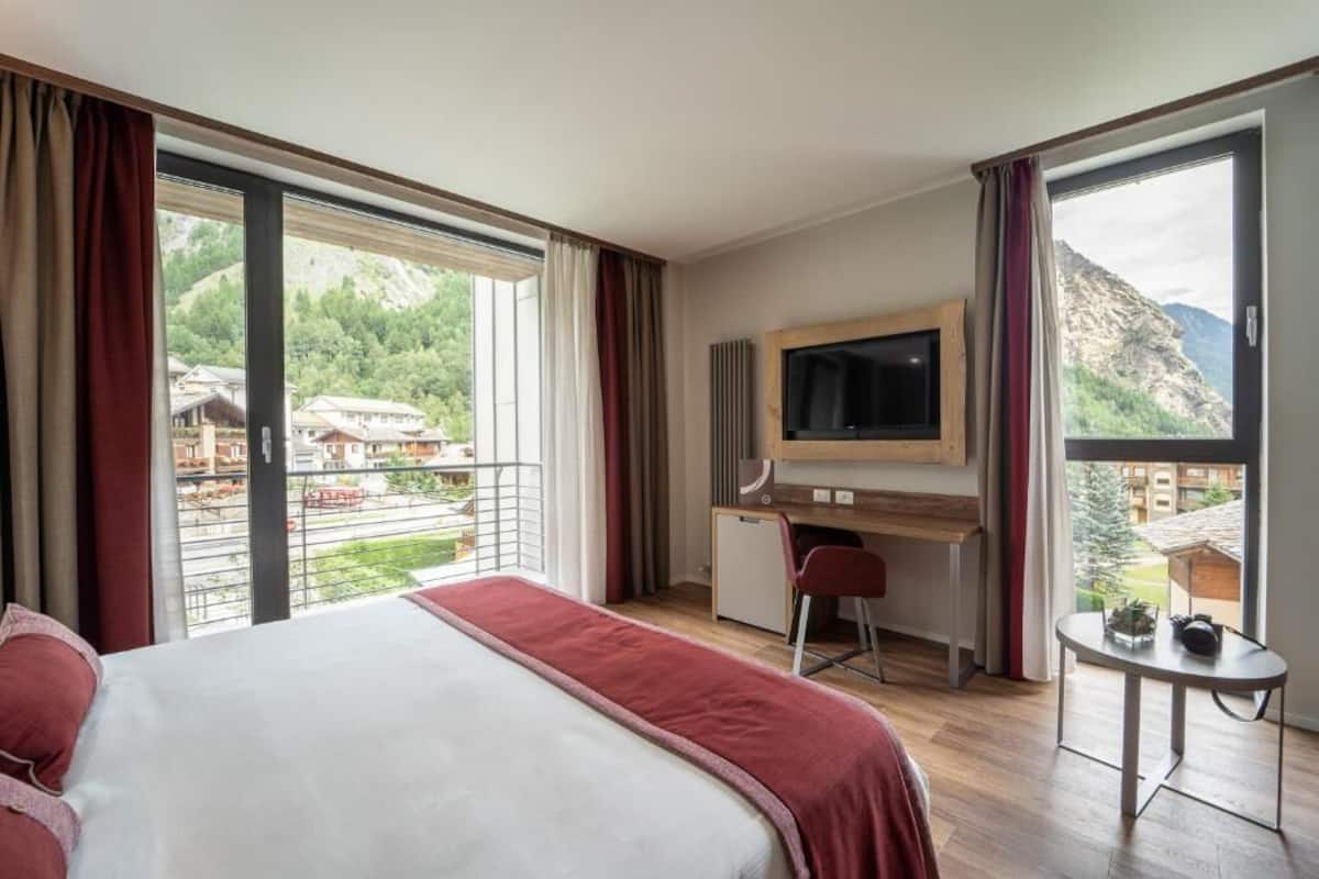 Minibar, bureau, lits bébé (en supplément), Wi-Fi gratuit