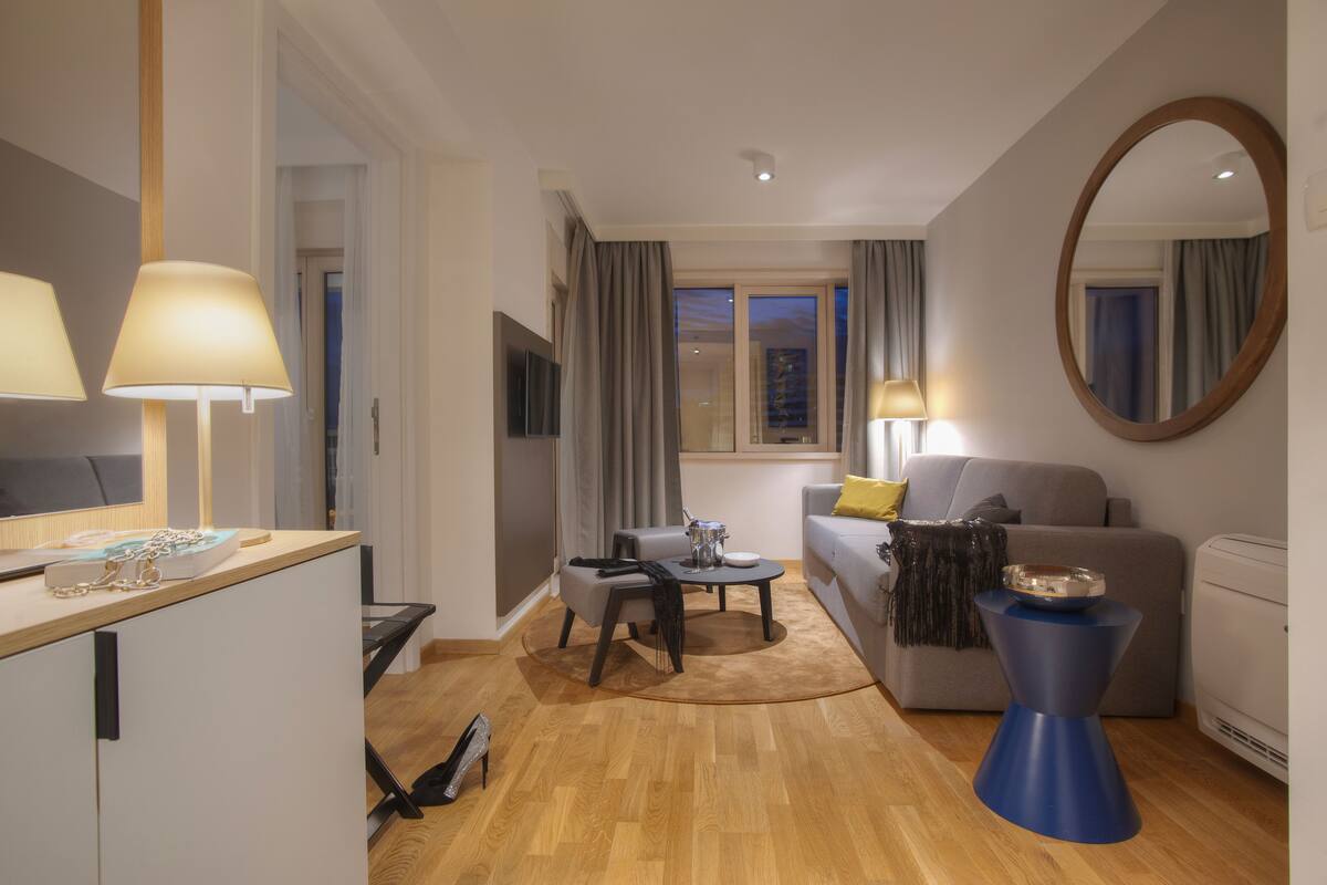 Deluxe Room, City View | Living area | LED TV