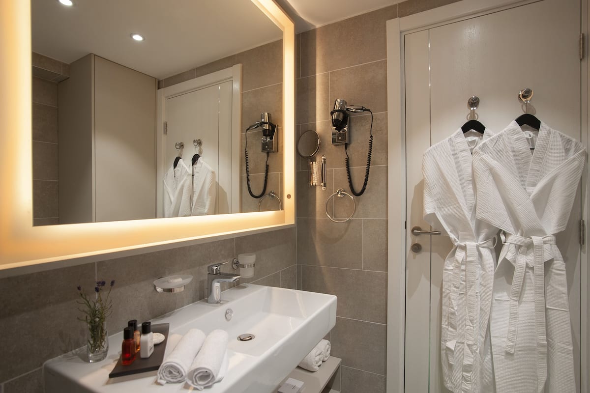 shower, free toiletries, hair dryer, bathrobes