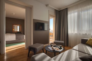Deluxe Room, Partial Sea View | Living area | LED TV