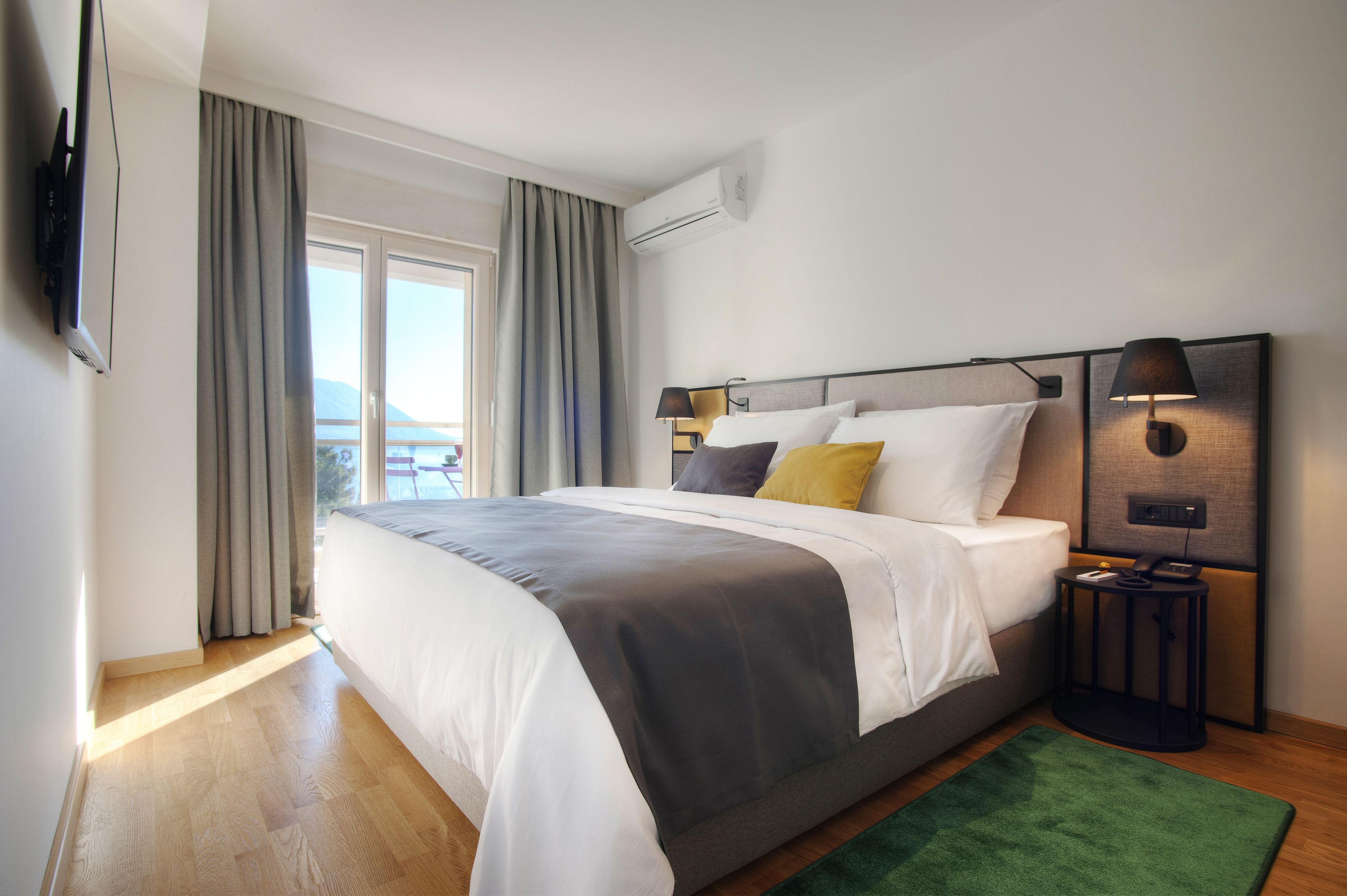 suite, sea view | minibar, in-room safe, desk, laptop workspace
