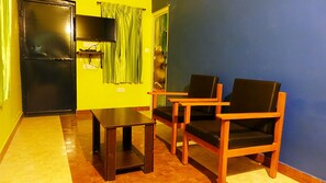 Single Bedroom with Living Room | Living area | Flat-screen TV, fireplace - The Bowers Chalet (Ootacamund)