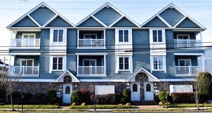 CLOSE TO ALL, a block from BEACH/BOARDS/ FAMILY FUN..Did we mention HEATED POOL!