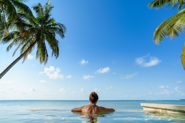 Outdoor pool, free cabanas, pool umbrellas