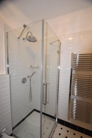 Shower, free toiletries, hair dryer, slippers