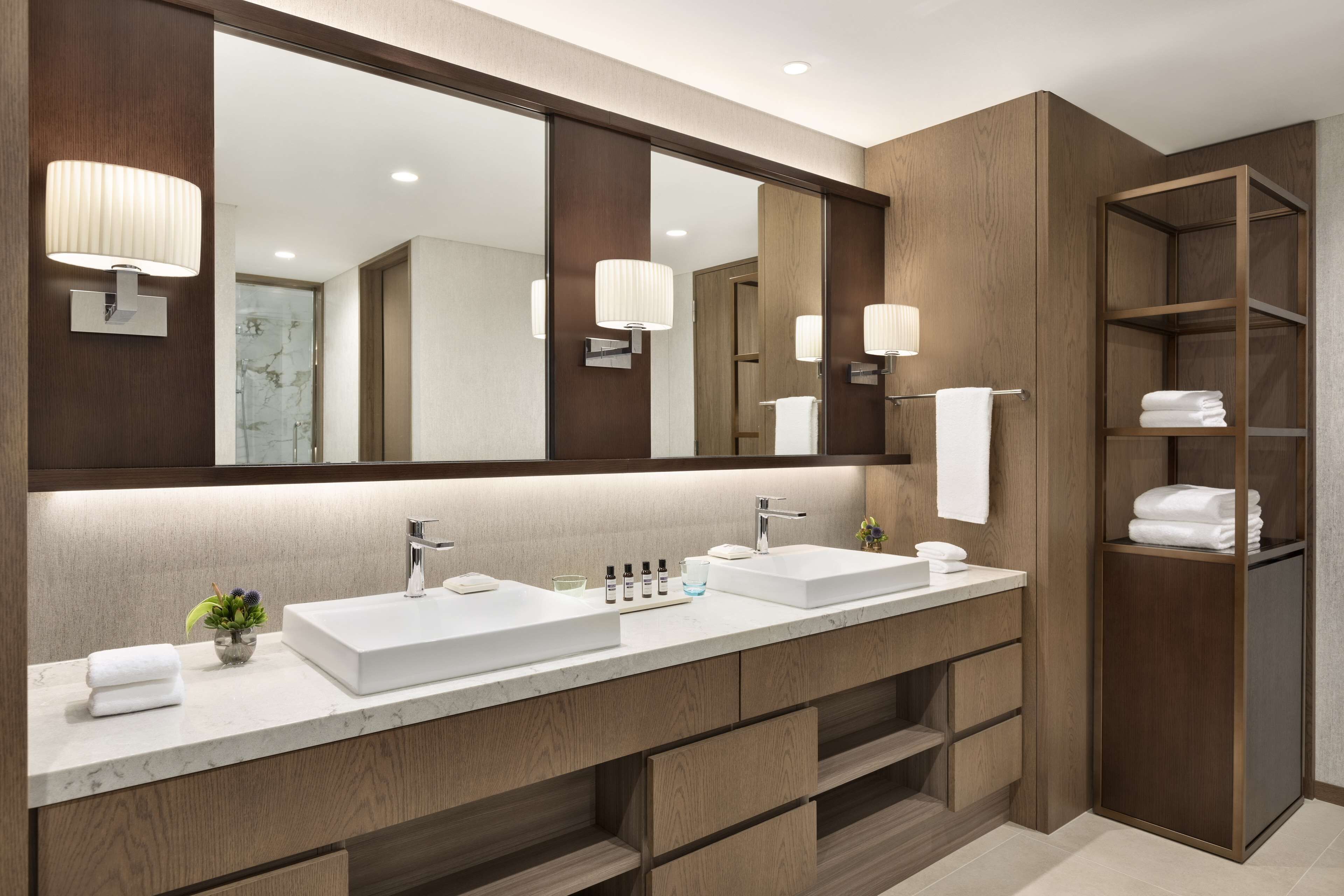 separate bathtub and shower, designer toiletries, hair dryer, bathrobes