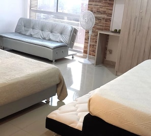 Family Apartment, Multiple Beds, Non Smoking | Minibar, iron/ironing board, free WiFi, bed sheets - Apartasuites Poblado (Medellín)