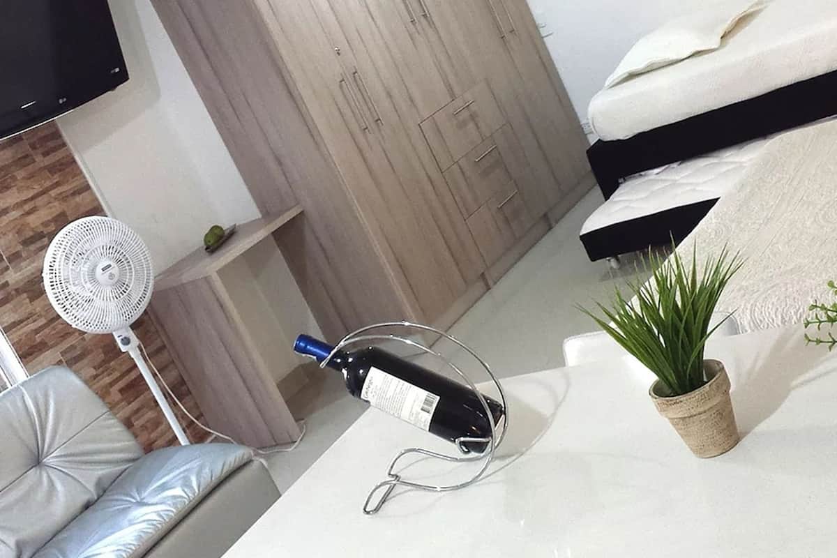 40-inch flat-screen TV with cable channels, TV