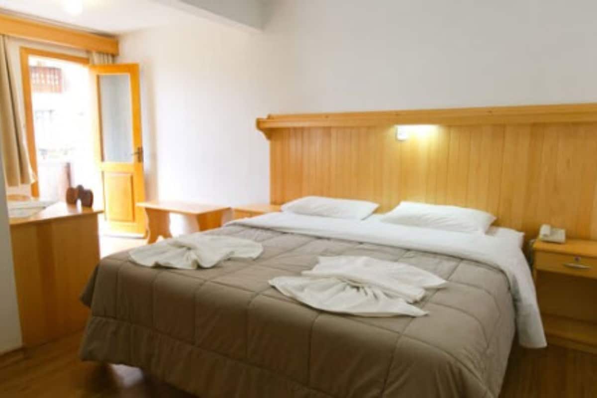 double or twin room, 1 double or 2 single beds | minibar, desk, blackout curtains, iron/ironing board