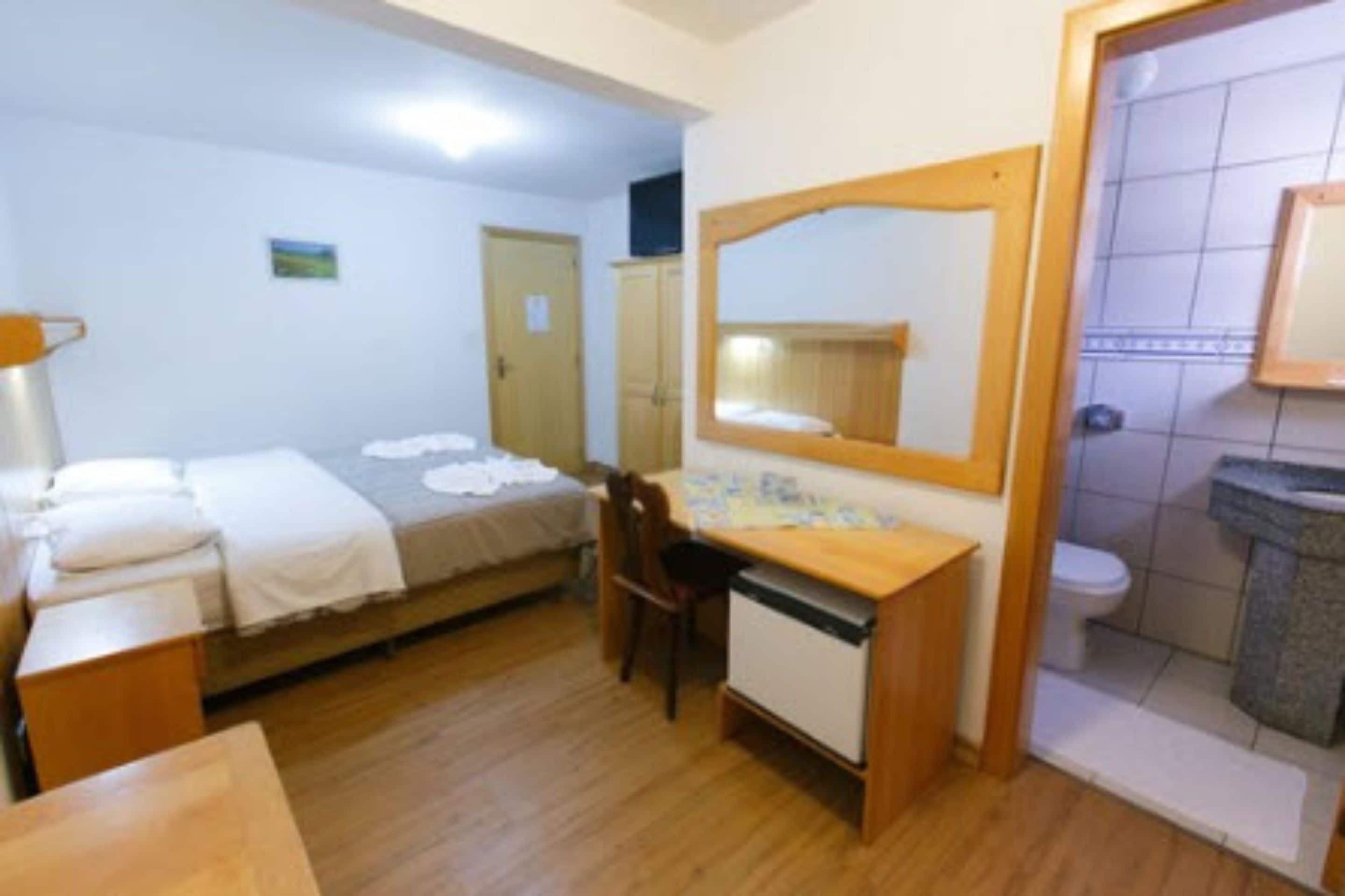 double or twin room, 1 double or 2 single beds | minibar, desk, blackout curtains, iron/ironing board